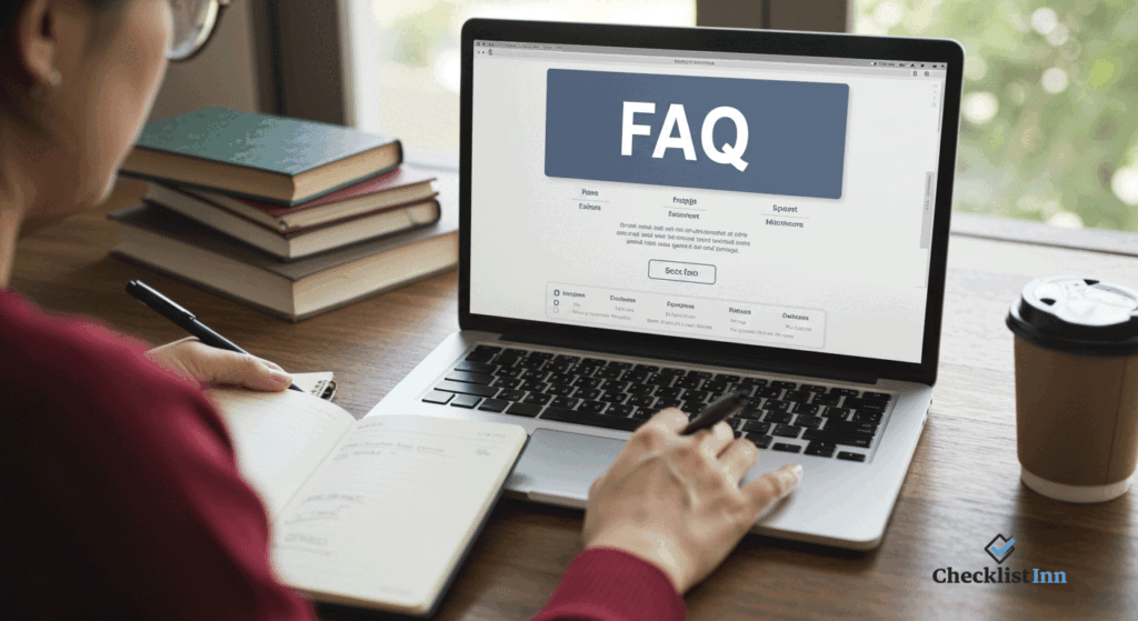 A person reading FAQs on a laptop while holding a notebook and pen at a tidy desk, symbolizing frequently asked questions about daily to-do lists.