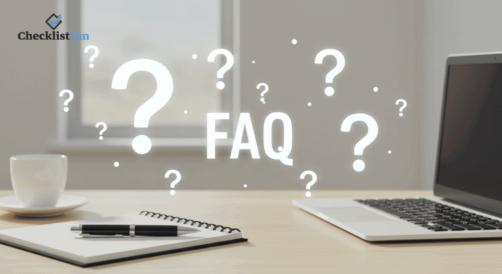 Workspace with laptop, notebook, and question mark icons representing FAQ